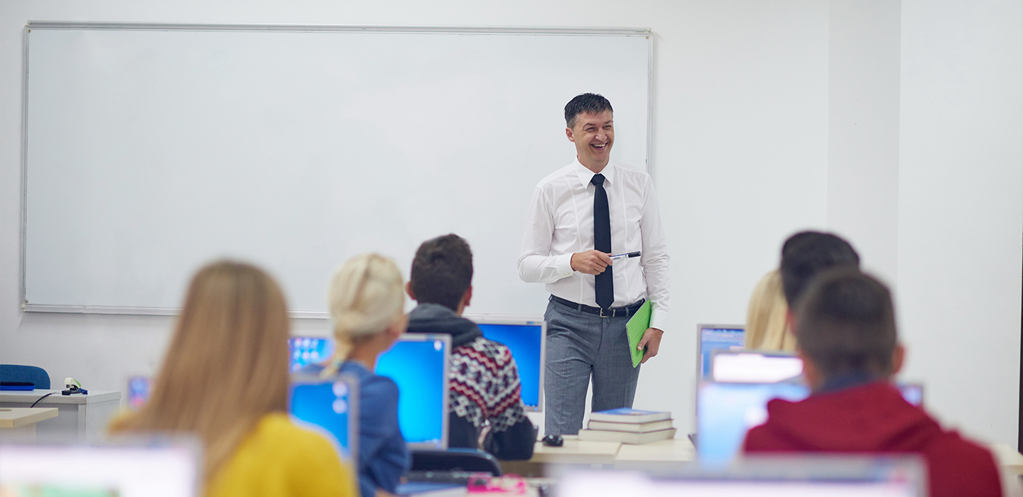 Teacher in lab with students