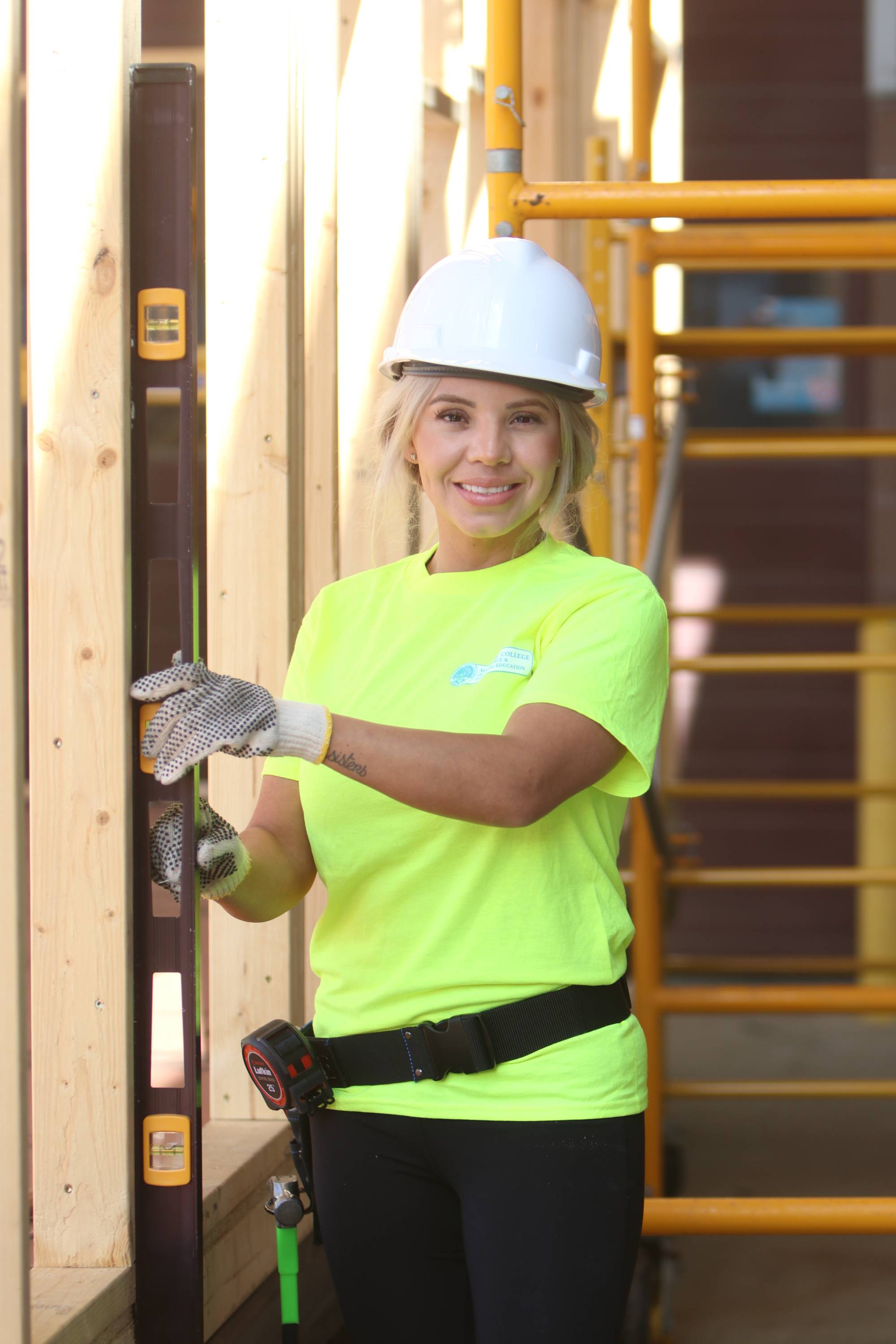 Construction student working on a tiny house. 