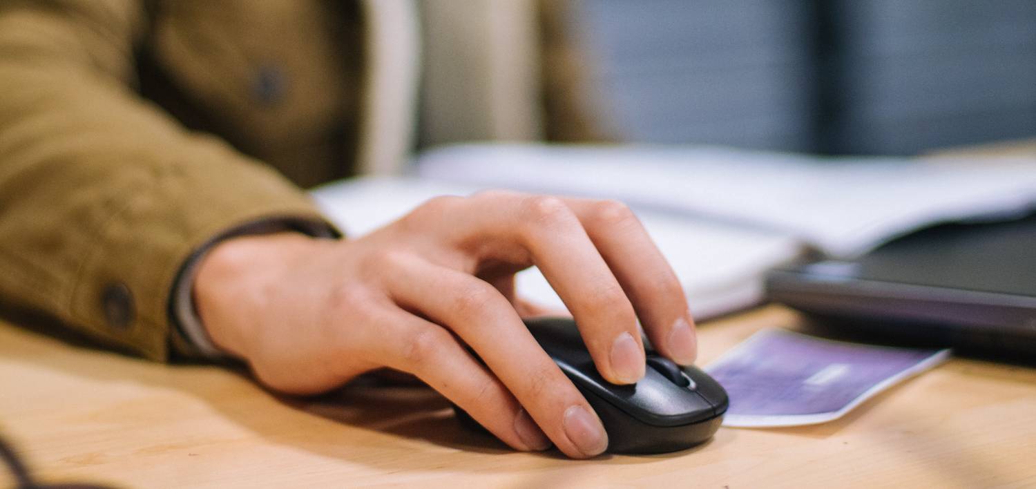 person using a computer mouse