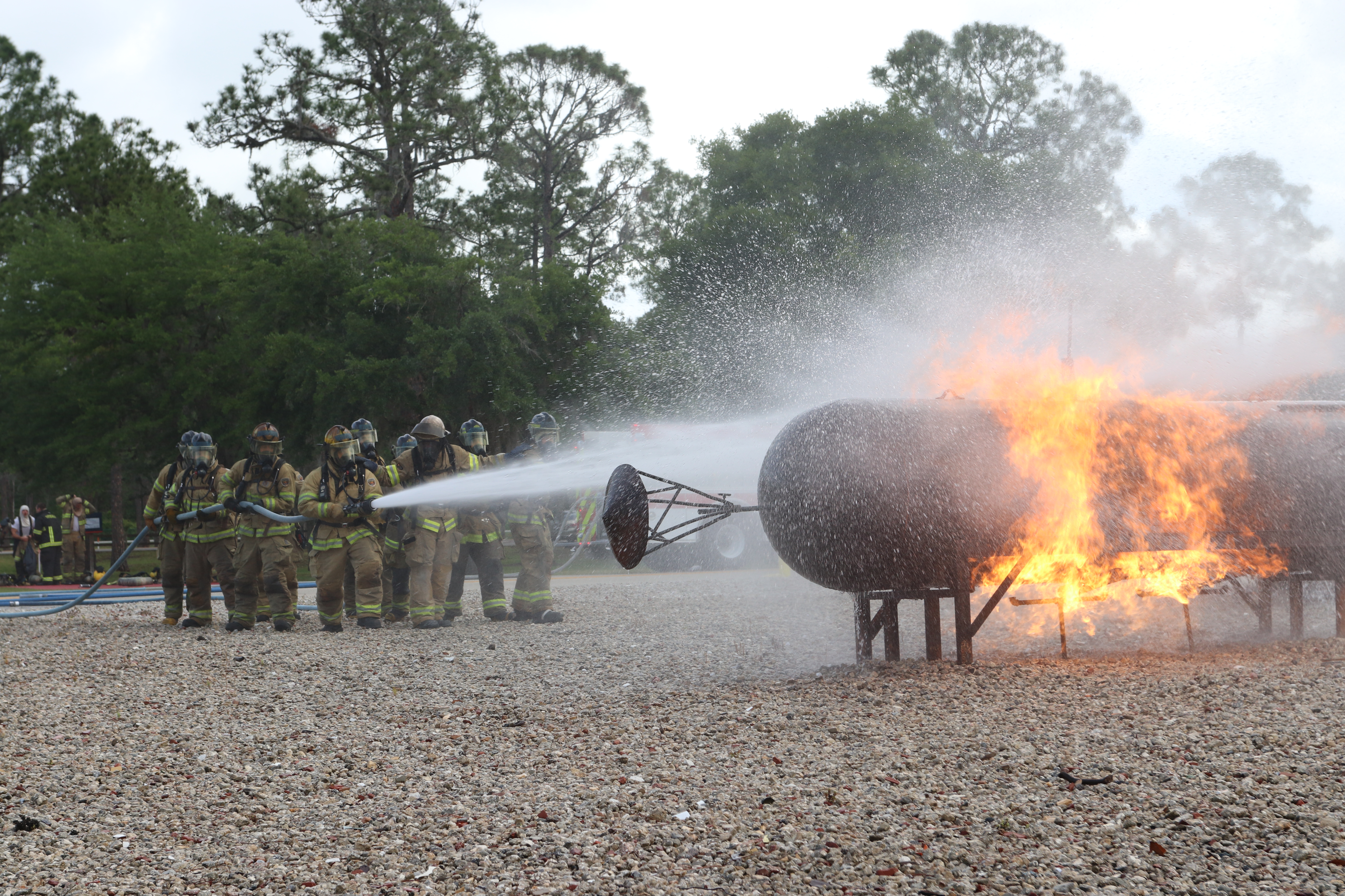 fire fighter with hose