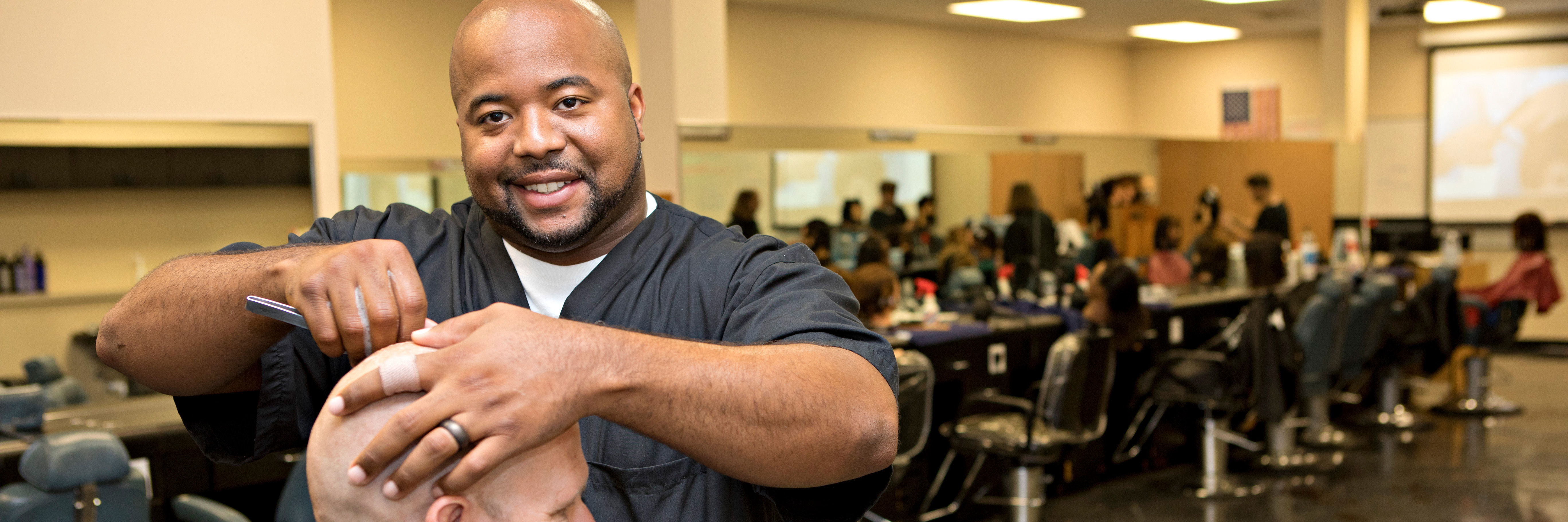 Barber giving a cut