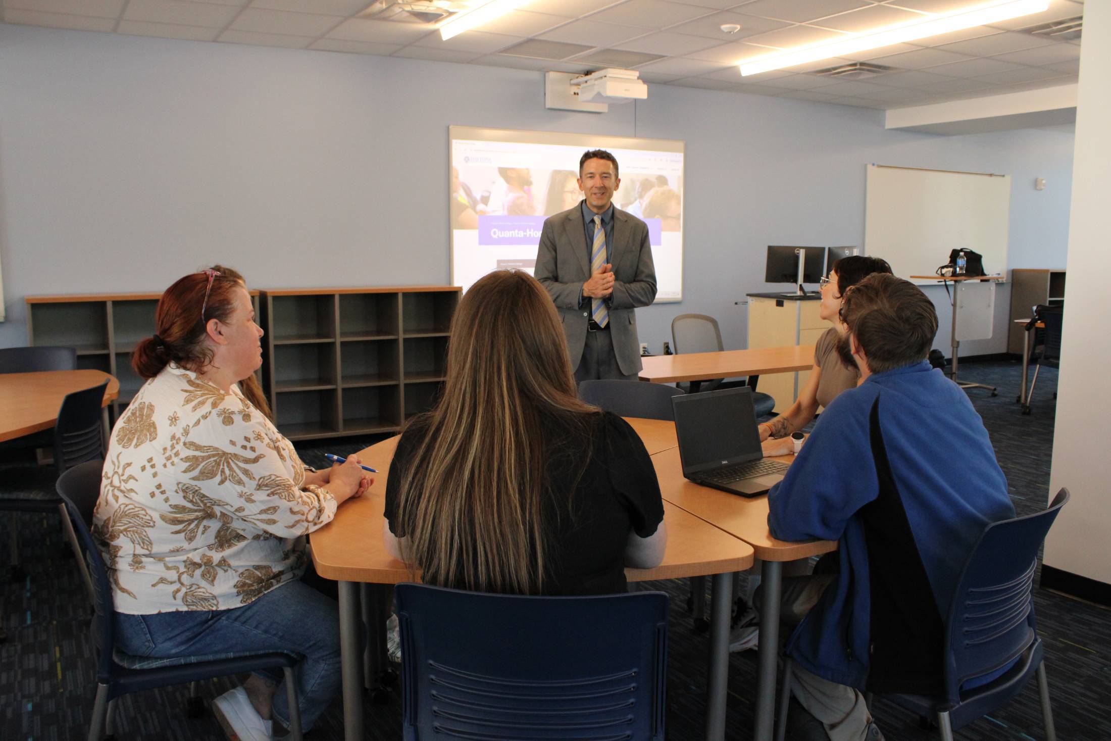 Ben Graydon teaching in a classroom. 