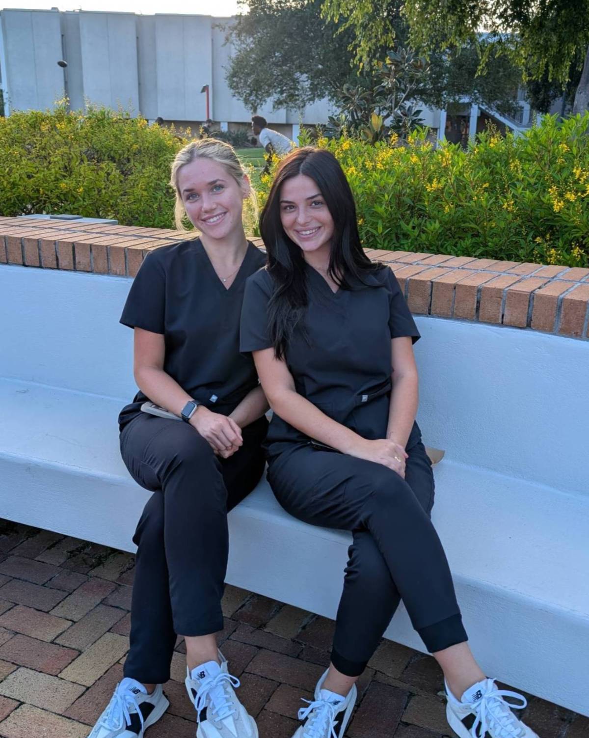 Two students enjoying Homecoming on campus. 