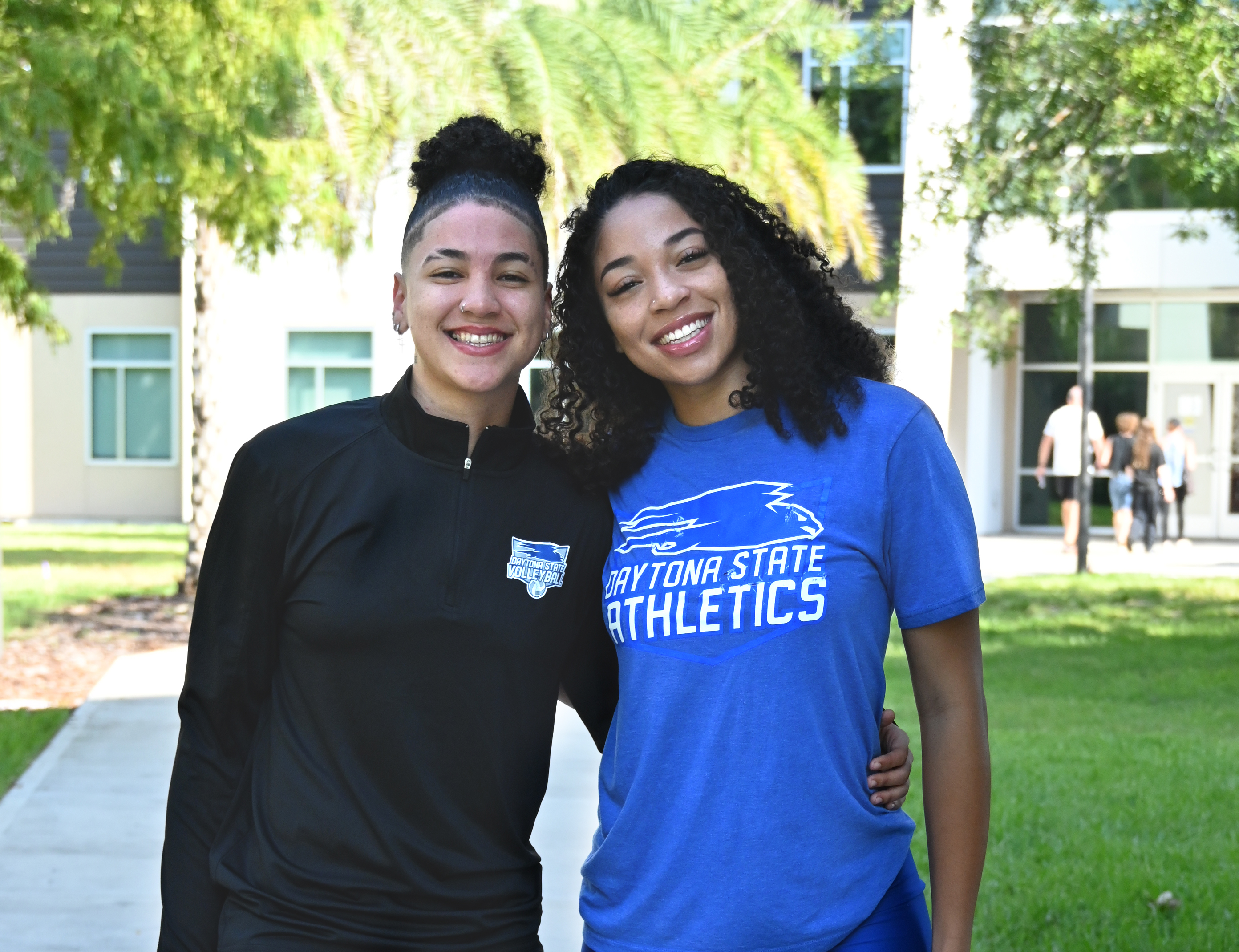 Two students moving into the on-campus residence hall.