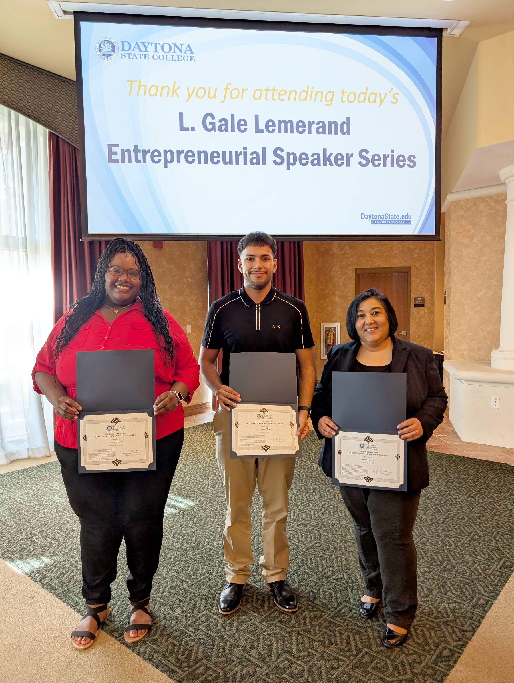 Three scholarship winners at the Lemerand Speaker Series. 