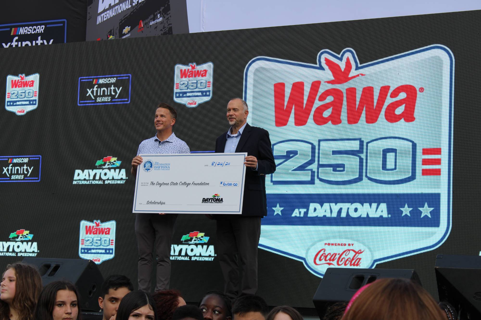 A check presentation with Frank Kelleher, President of Daytona International Speedway, and Dr. Tom LoBasso, President of Daytona State College. 