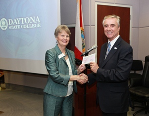 Frank Bruno, chair of the Volusia County Council, presented Daytona State College President Carol Eaton with an annual check of $10,000 for the college’s Public Broadcasting Station, WDSC-TV 15. 