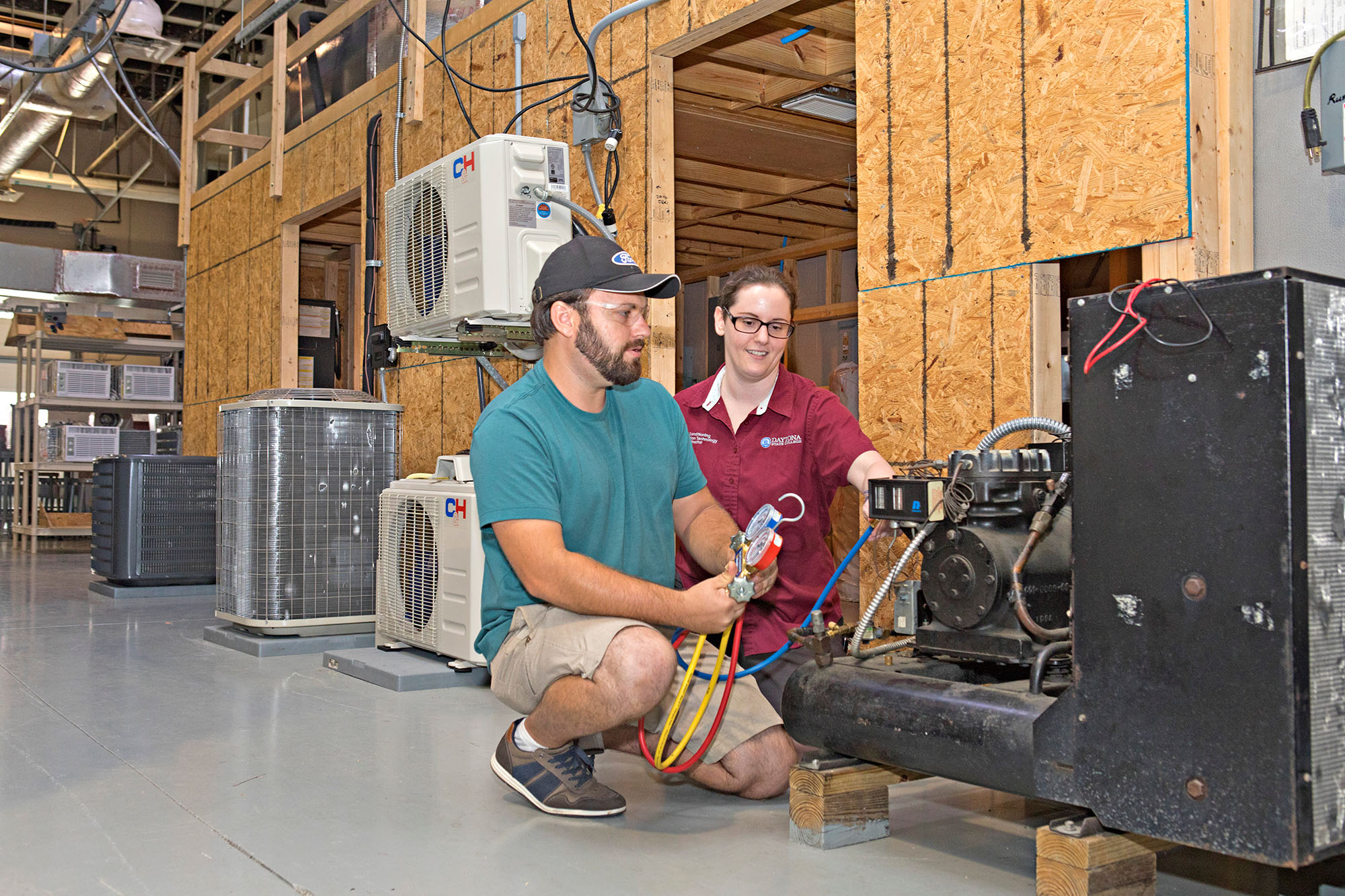 Air conditioning repair student working. 