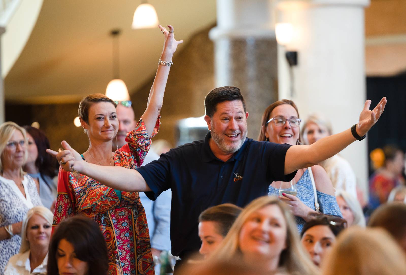 A group of smiling event attendees.