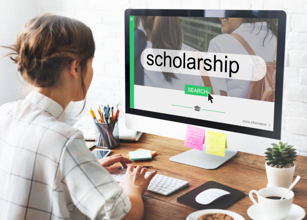 Student applying for scholarships on the computer